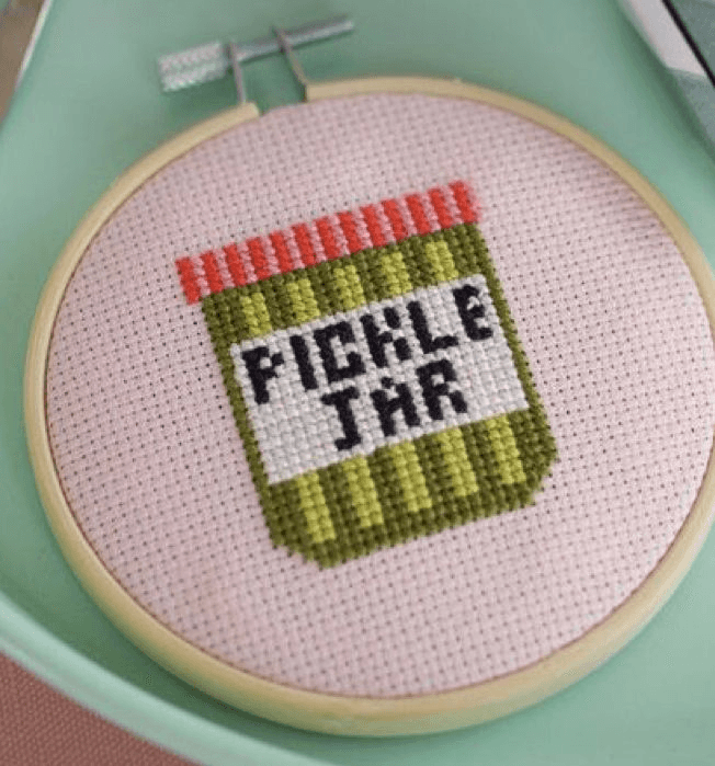 Colorful cross stitch thread and fabric